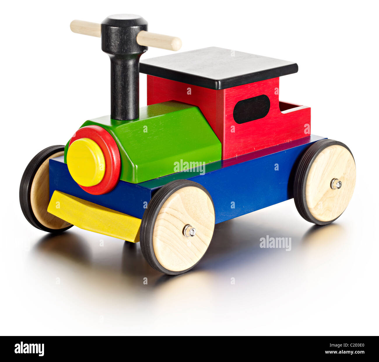 Corsa di legno sul treno del giocattolo Foto Stock
