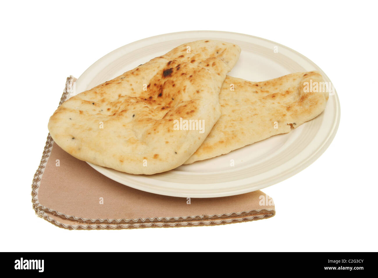 Due tipi di pane naan su una piastra con un tovagliolo Foto Stock