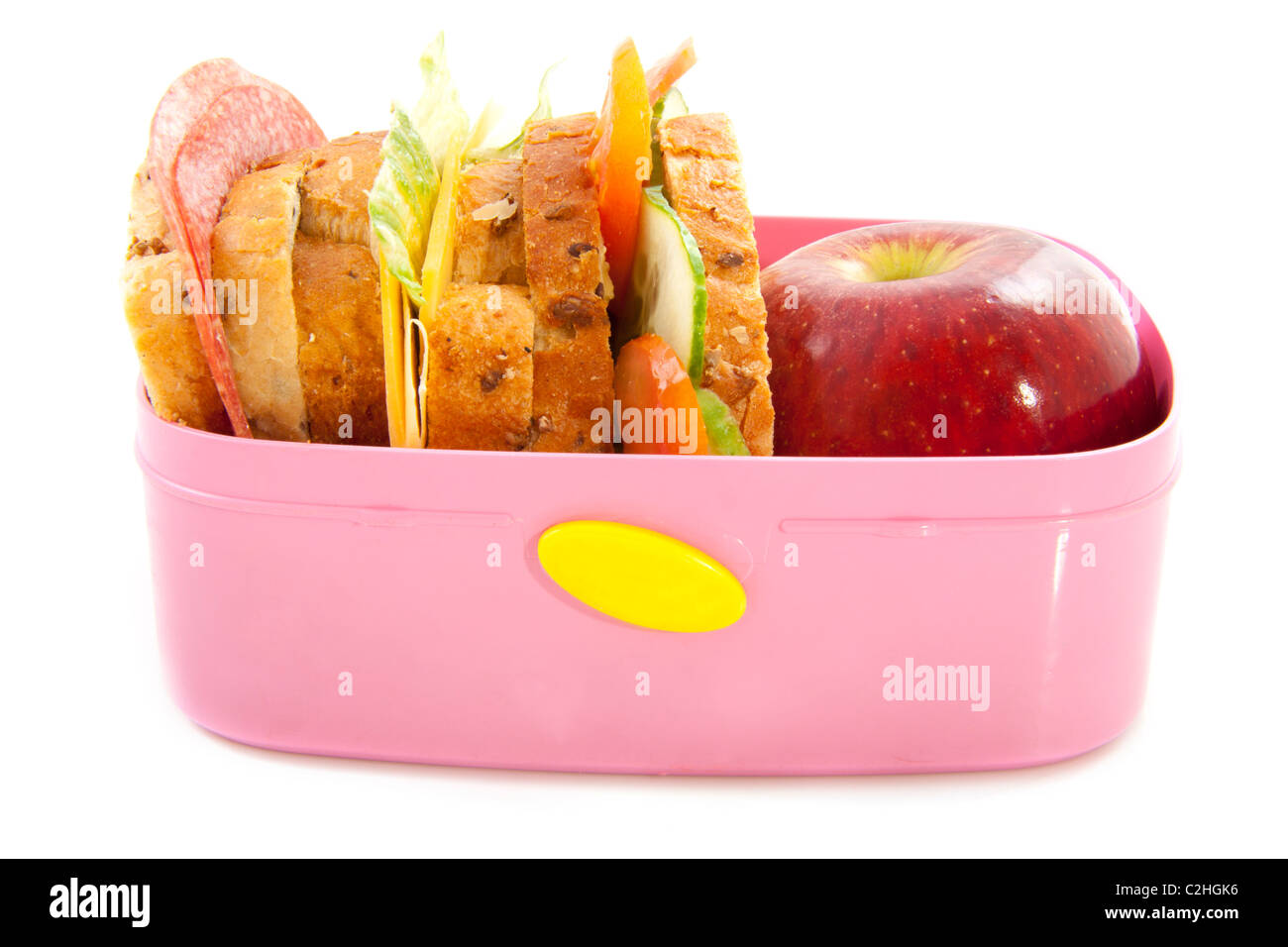 Pranzo sano nel riquadro rosa isolato su bianco Foto Stock