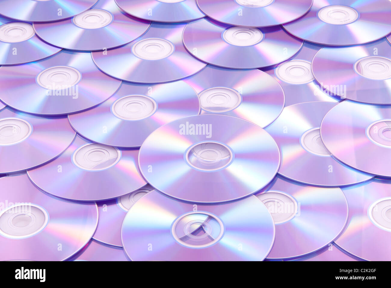 Un sacco di dischi colorati su una pila per uso in background Foto Stock