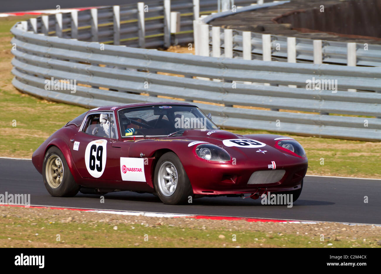 Gary Raffray nel 1969 Marcos GT durante la CSCC oscillante serie degli anni Sessanta gara a Snetterton, Norfolk, Regno Unito. Foto Stock