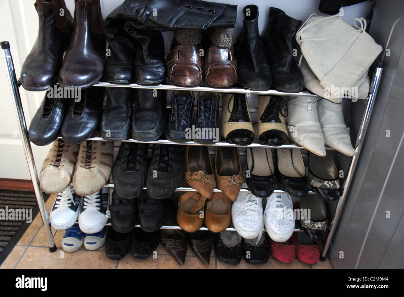 Rastrelliera per scarpe, scarpe, stivali Foto Stock