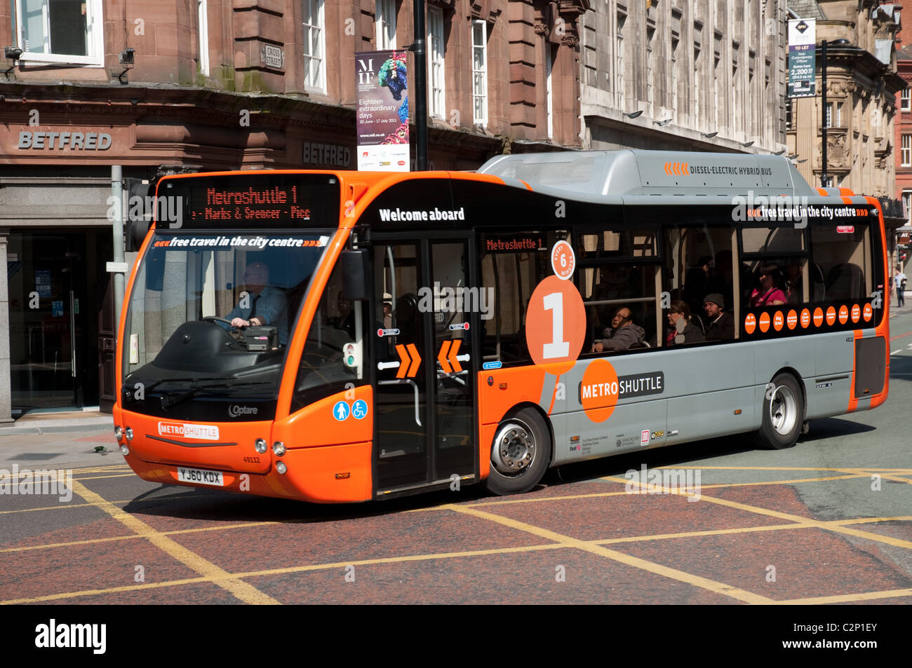 Bus Metroshuttle, offre un servizio gratuito attraverso il centro della città di Manchester. Foto Stock