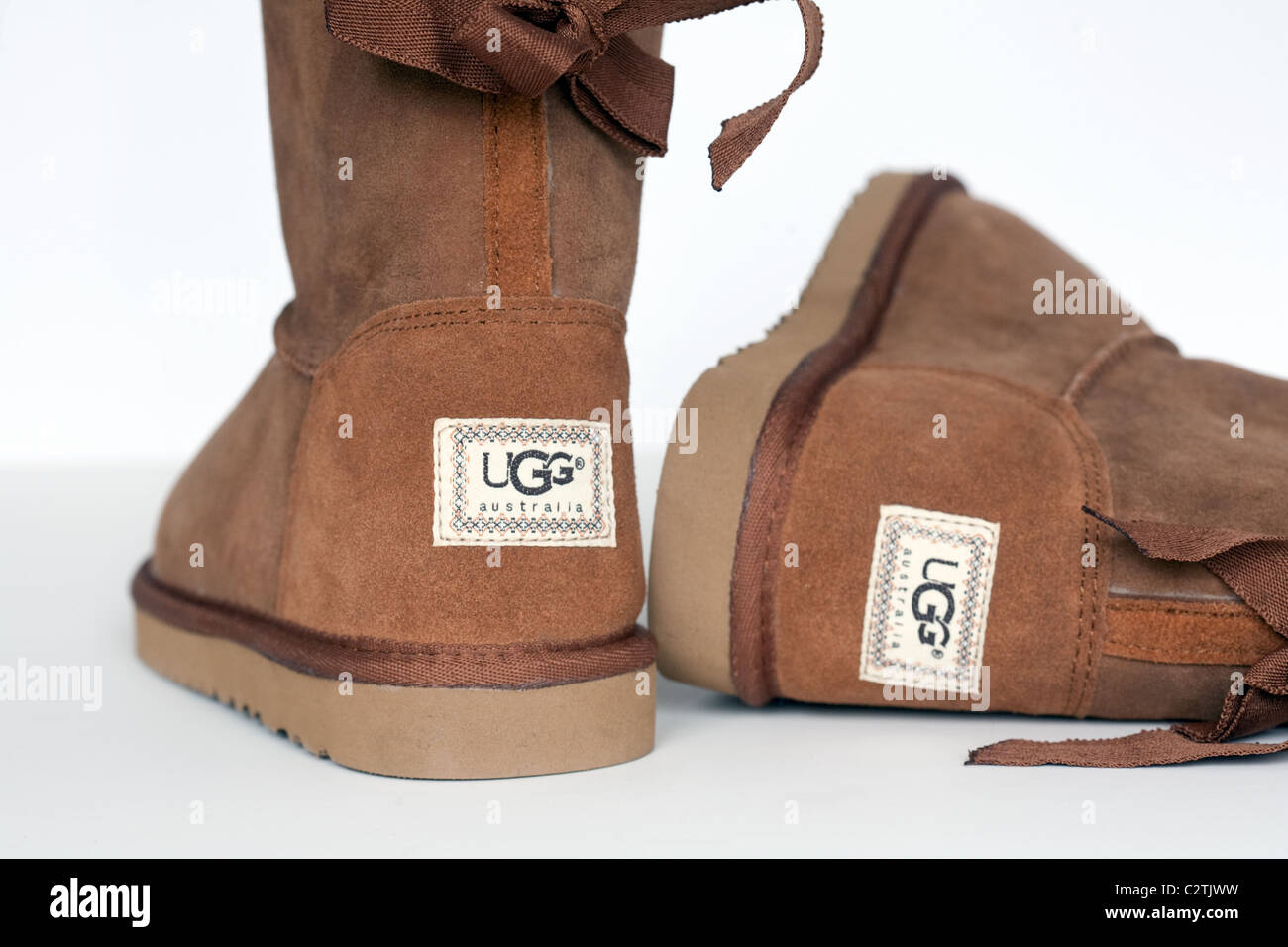 Una coppia di merci contraffatte ugg stivali realizzati in Cina Foto Stock
