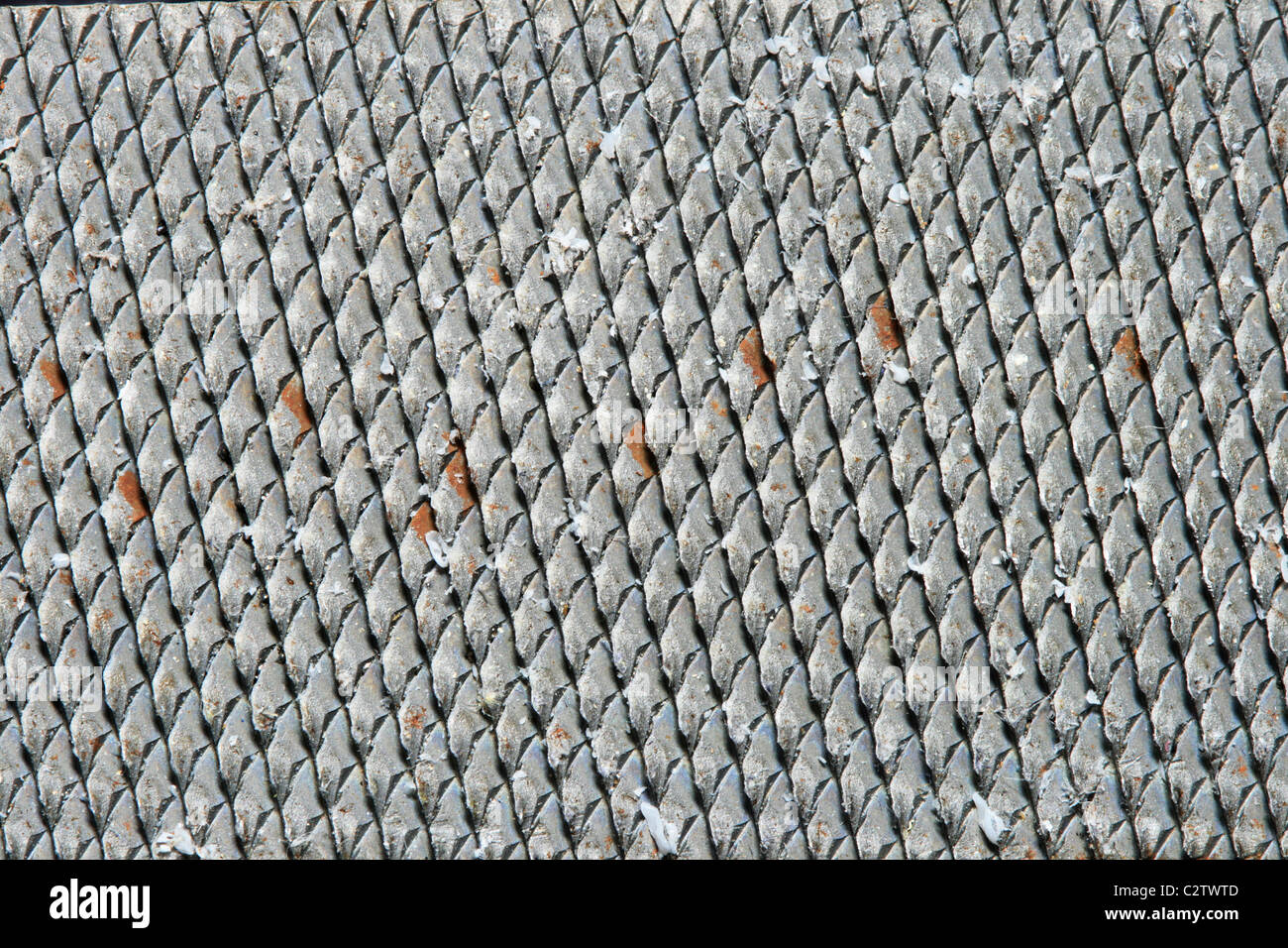 Macro di un metallo ruvida per file texture di sfondo Foto Stock