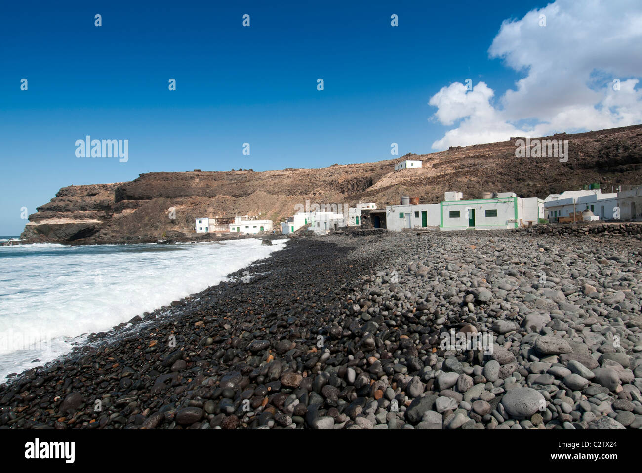 Stoney spiaggia di Los Molinos borgo peschereccio di Fuerteventura isole Canarie Foto Stock