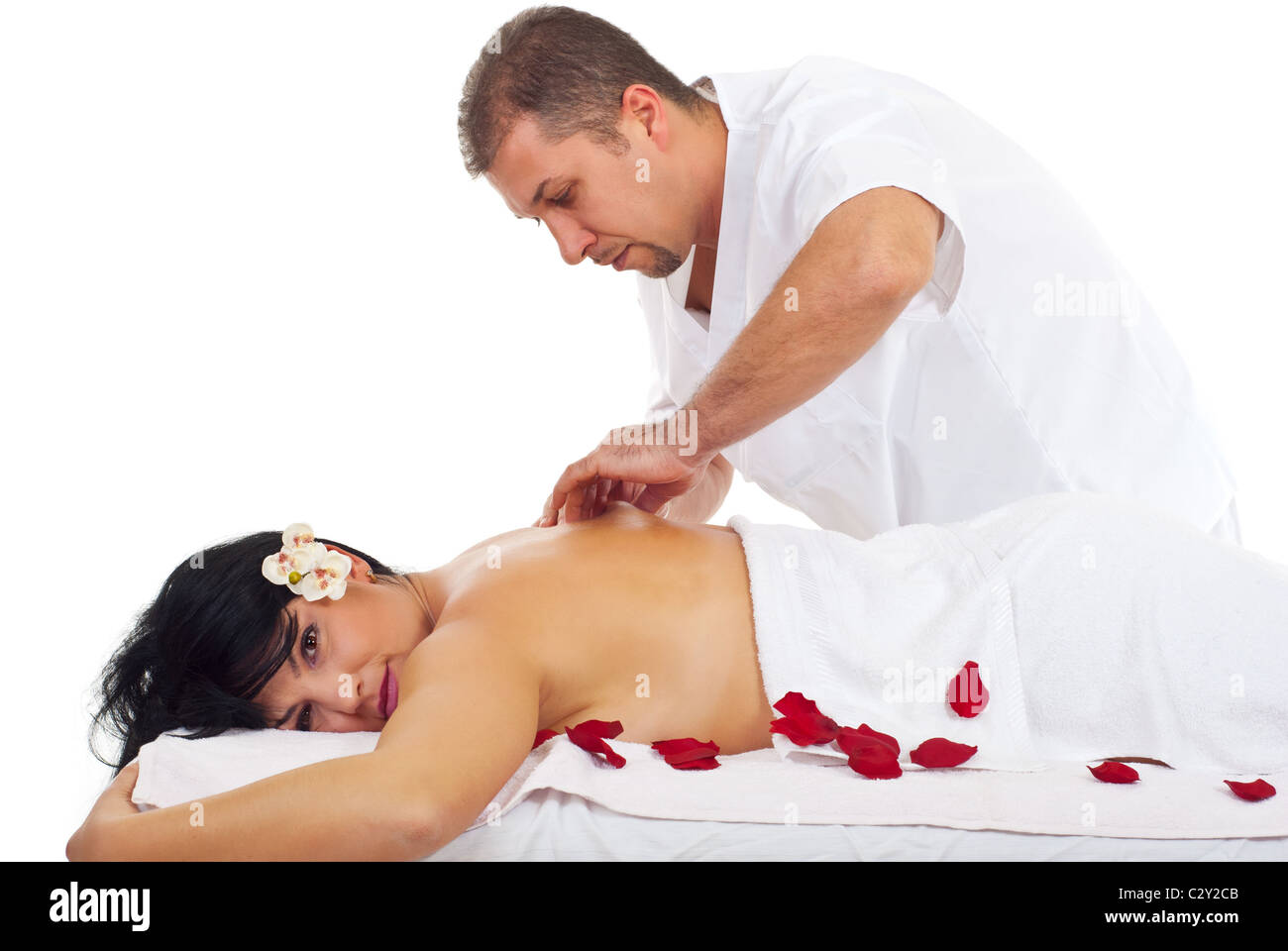 Massaggiatore uomo applicare impastata massaggio della cute sulla donna  torna a spa resort Foto stock - Alamy