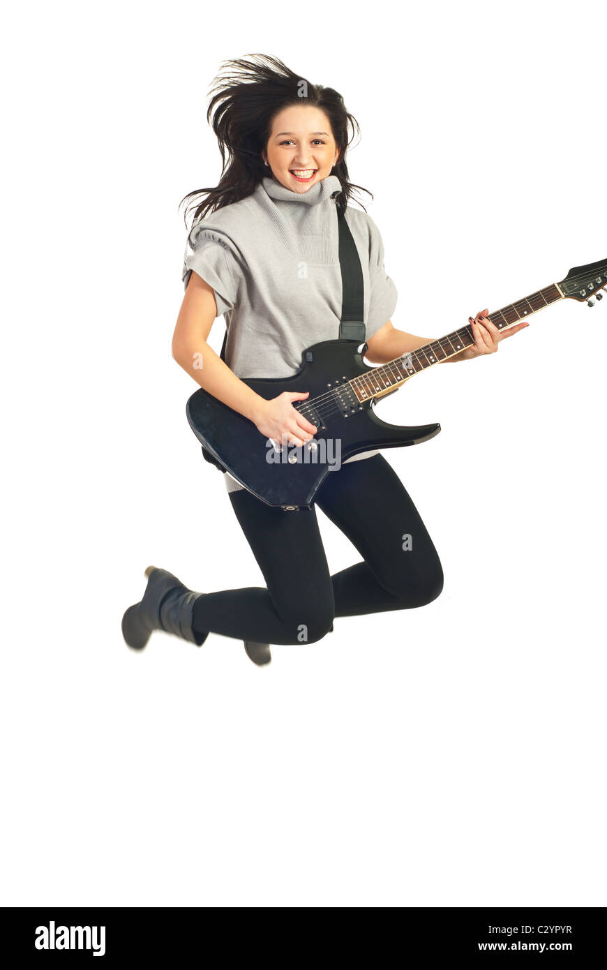 Jumping chitarrista donna con chitarra isolato su sfondo bianco Foto Stock