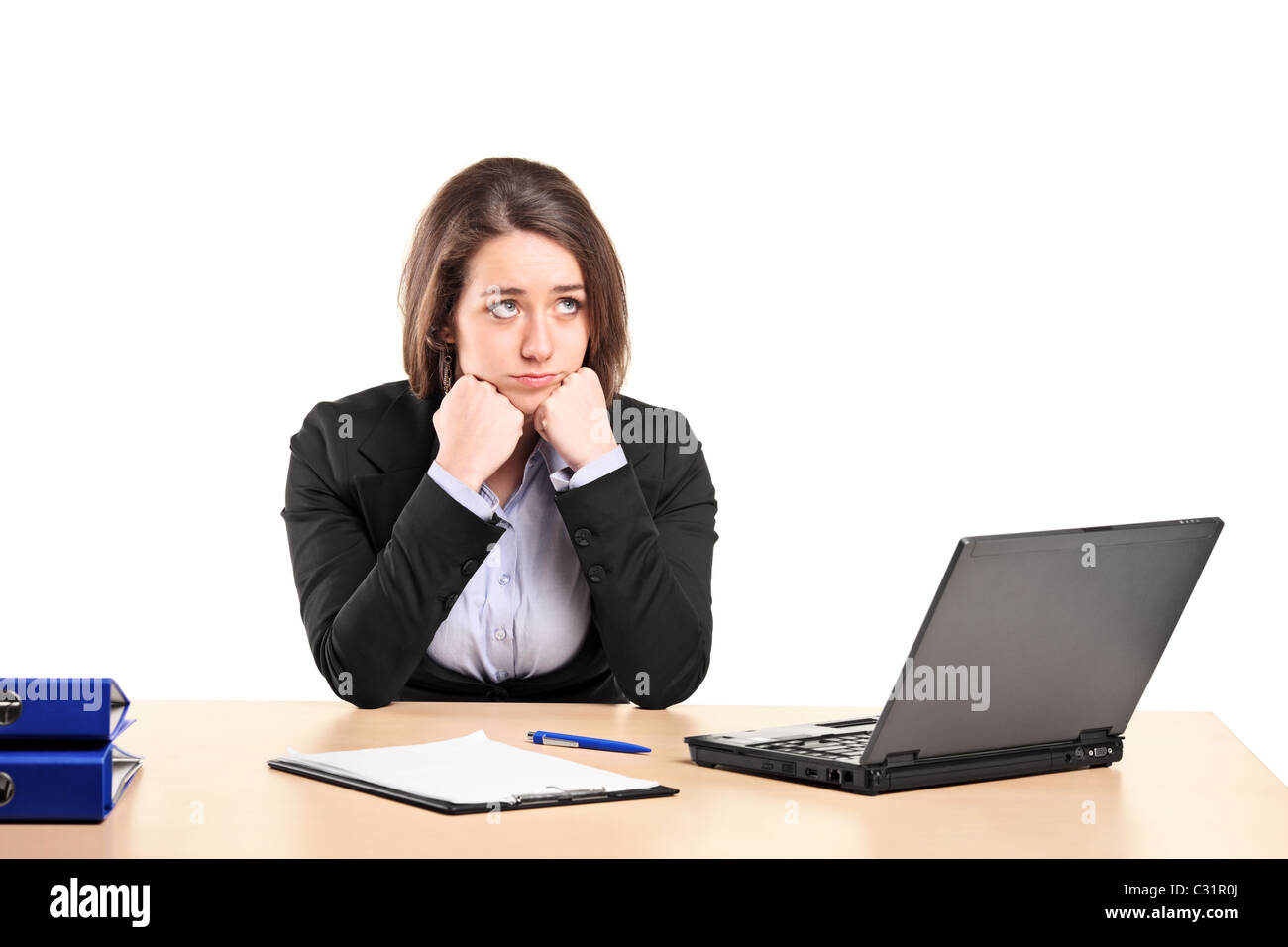 Triste giovane imprenditrice nel suo ufficio Foto Stock