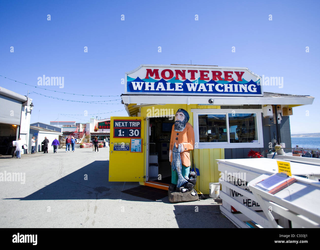 Monterey, California Whale Watch storefront centro sul pontile del pescatore Foto Stock