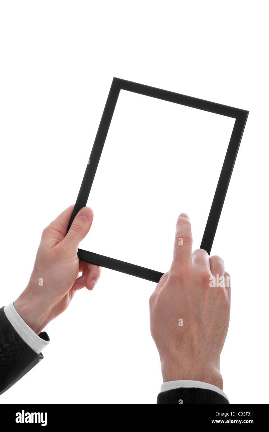 Un maschio di mano che tiene un touchpad pc, un dito tocca lo schermo, isolato su bianco Foto Stock