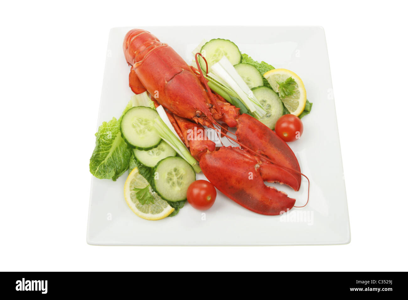 Tutto a base di aragosta cotta con insalata su una piastra Foto Stock