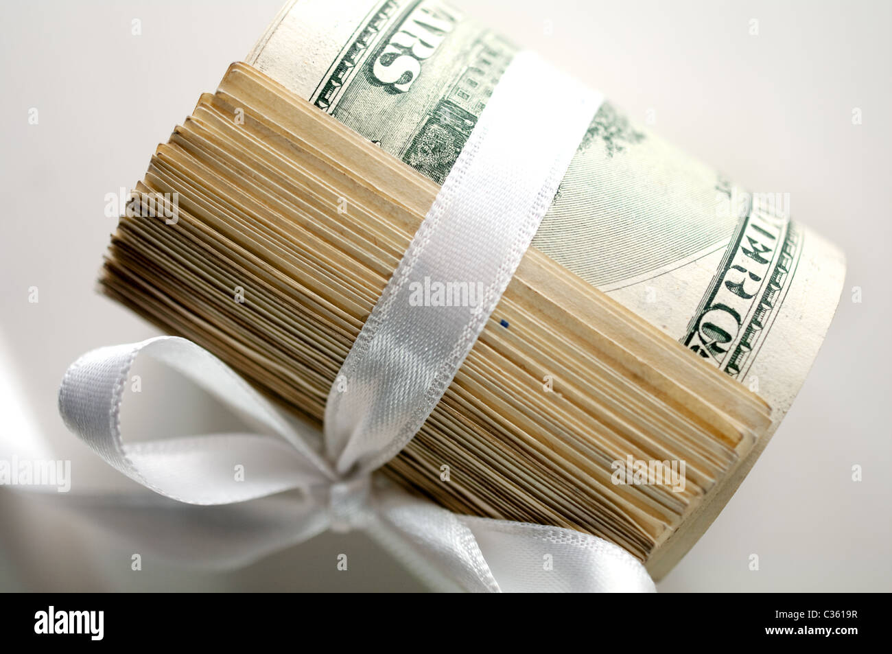 Dollar roll serrati con nastro Foto Stock