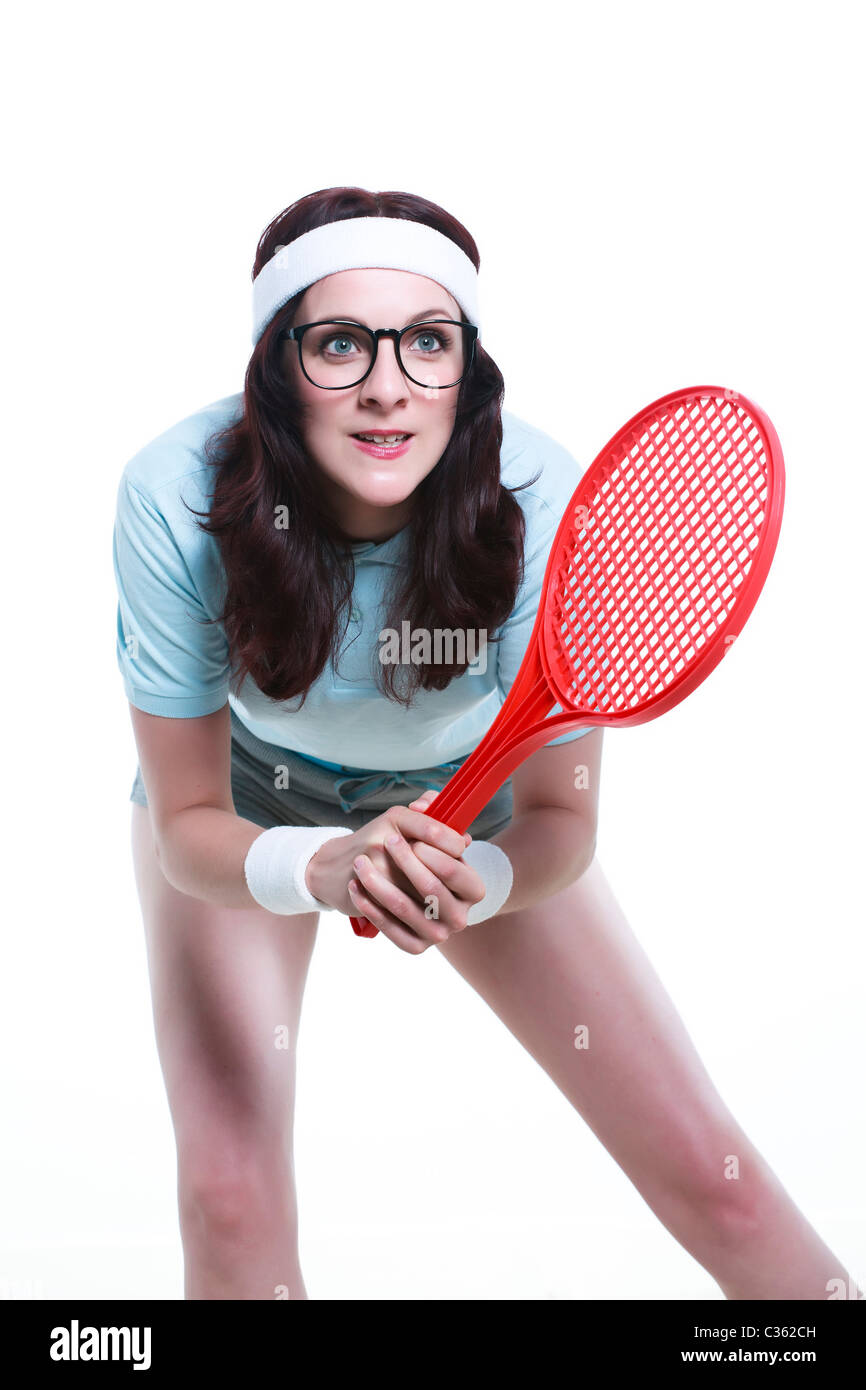 Femmina competitivo geek con tennis bat Foto Stock