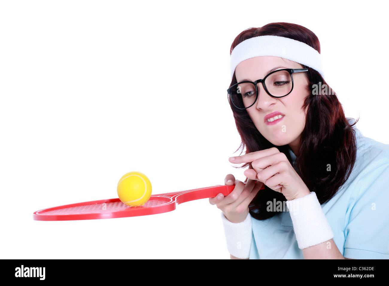 Geek femmina occhi di una palla da tennis Foto Stock