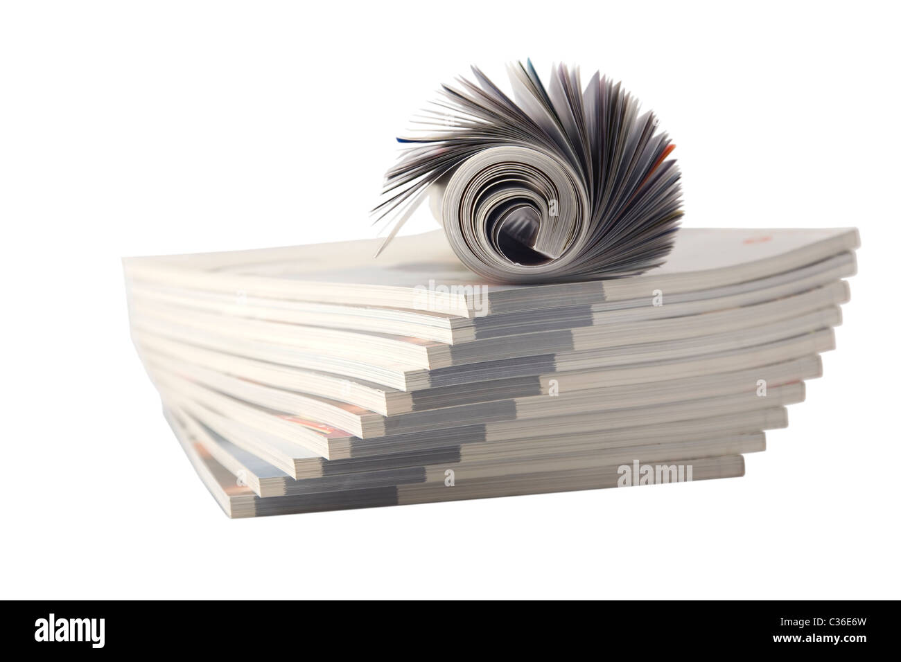 Il rullo caricatore isolato su bianco su un mucchio di altre riviste Foto Stock