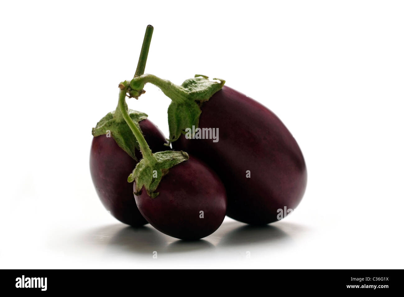 Tre melanzane intero Foto Stock