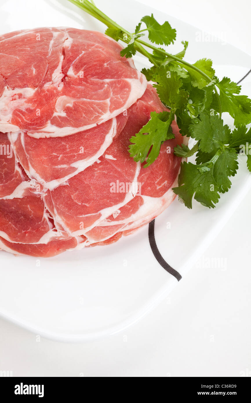 Fette di carne di montone cotto in hot pot Foto Stock