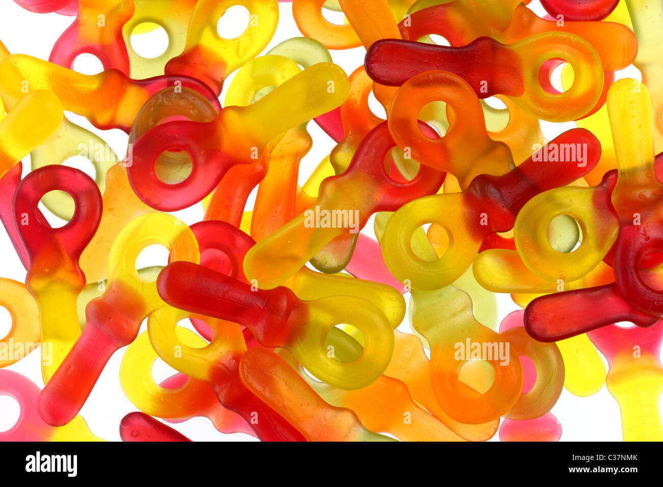 Caramelle gommose, diversi colori, gusto, contiene un sacco di zucchero e aromi artificiali. Forma di bimbo di dummy. Foto Stock