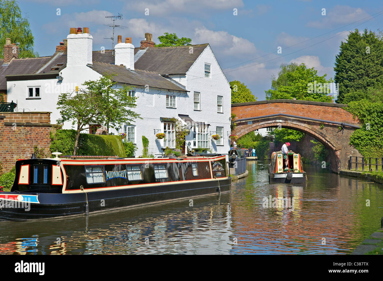 Bridgewater casa sul canale a Lymm con narrowboats. Foto Stock