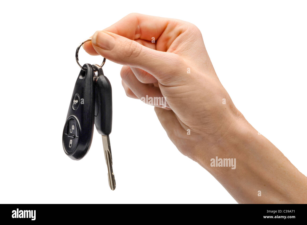 La mano e le dita tenendo le chiavi dell'auto Foto Stock