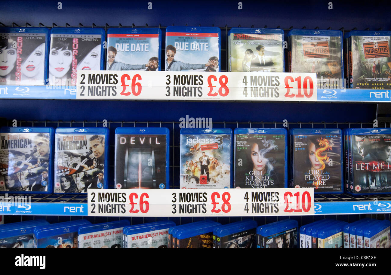 Ripiani di DVD DVD film a noleggio, Blockbuster video, Wallingford Oxfordshire Foto Stock