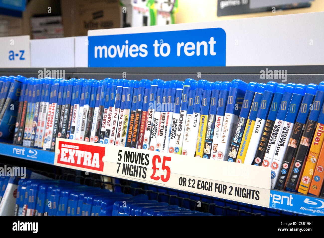 Ripiani di DVD DVD film a noleggio, Blockbuster video, Wallingford Oxfordshire Foto Stock