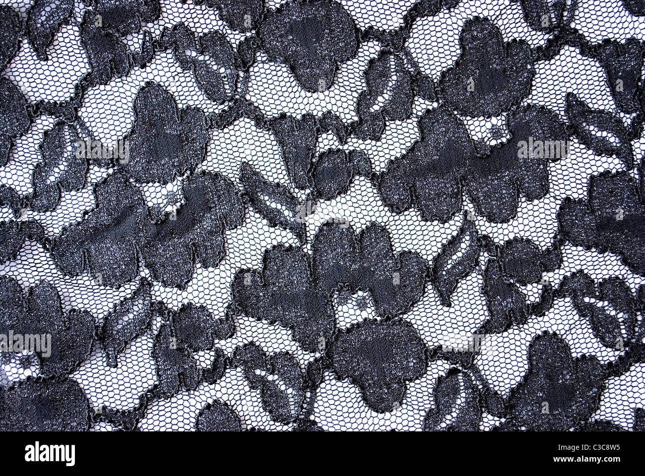 Pizzo nero lo sfondo con fiori Foto Stock