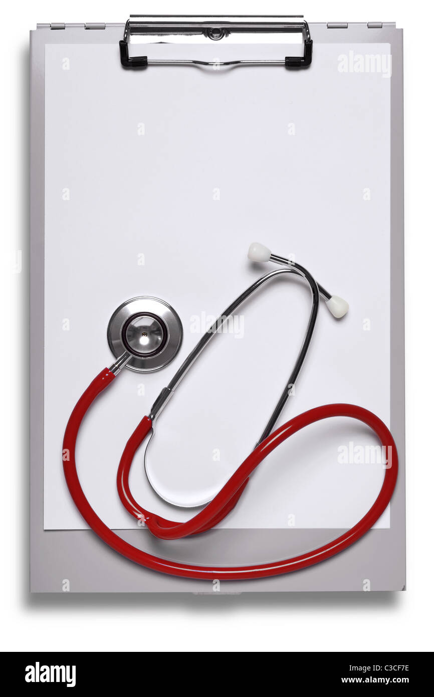 Foto di un ospedale in metallo negli appunti e stetoscopio con fogli di carta bianca per aggiungere le tue proprie note Foto Stock