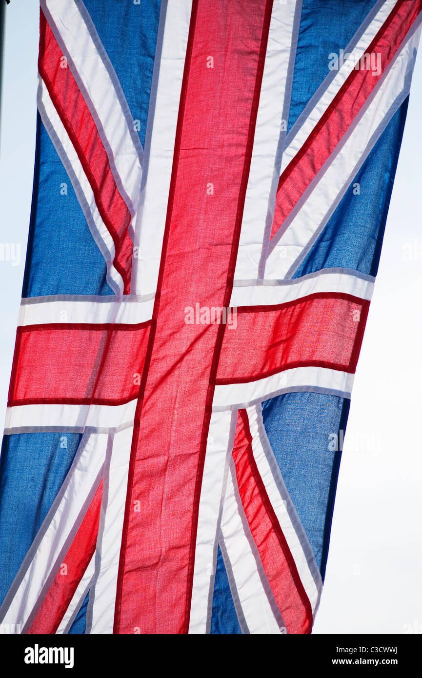 Unione bandiera appesa a Londra in piazza del Parlamento. Foto Stock
