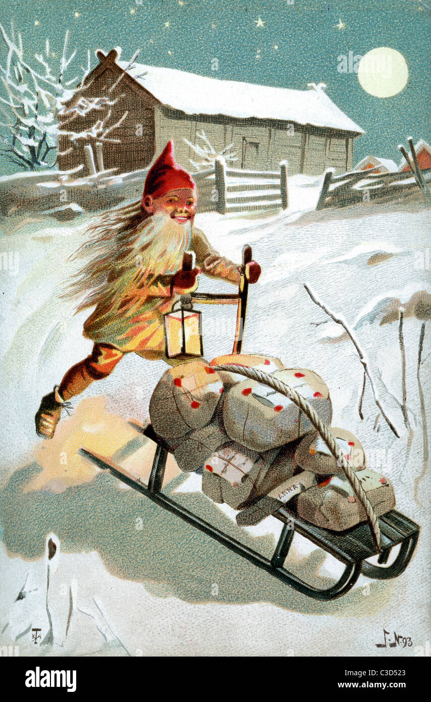 Un Natale elf o gnome erogare presenta Foto Stock