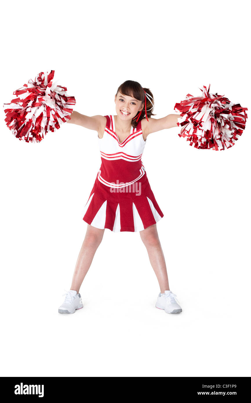 Cheerleader in azione con la sua pom-pom Foto Stock
