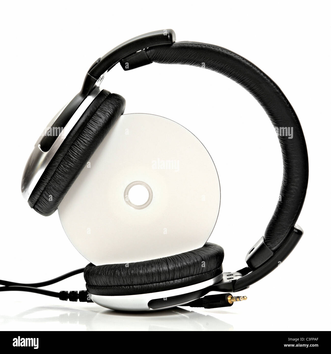 Cuffie con compact disc Foto Stock