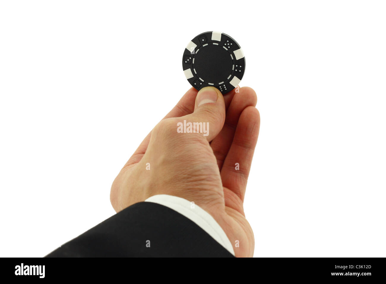 Business man mano tenendo un chip casino Foto Stock