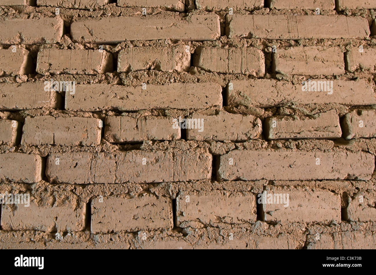 Tradizionali mattoni di fango in parete presso la missione di San Antonio de padova, Monterey County, California Foto Stock