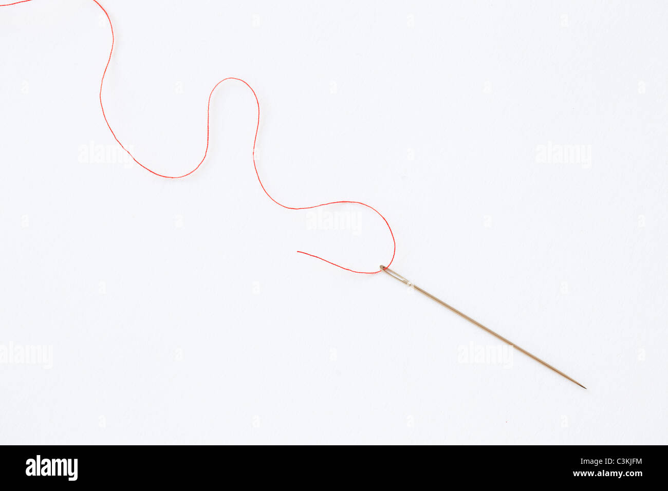 Ago con filo, studio shot Foto Stock