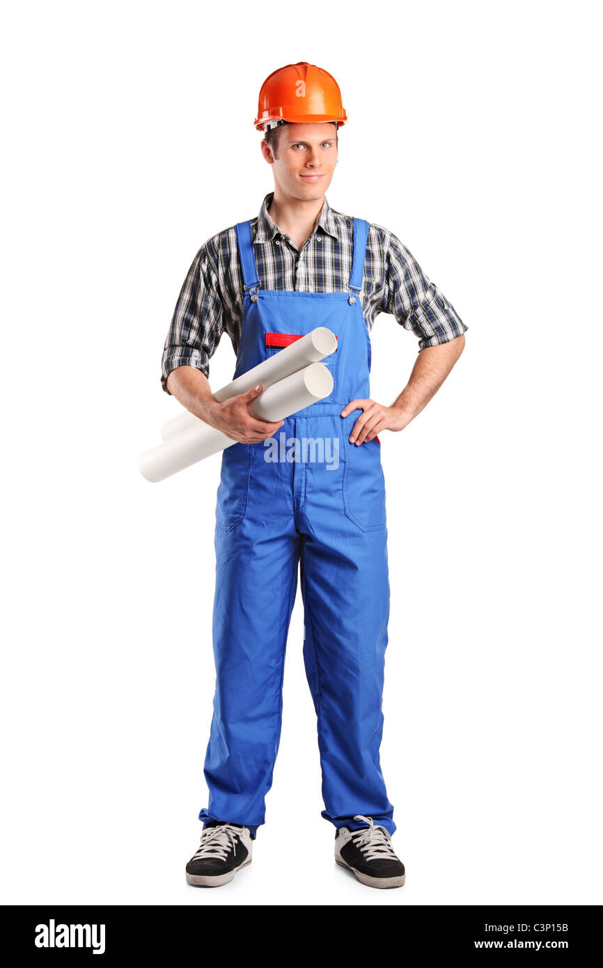 A piena lunghezza Ritratto di un lavoratore edile che indossa il casco e azienda blueprints Foto Stock