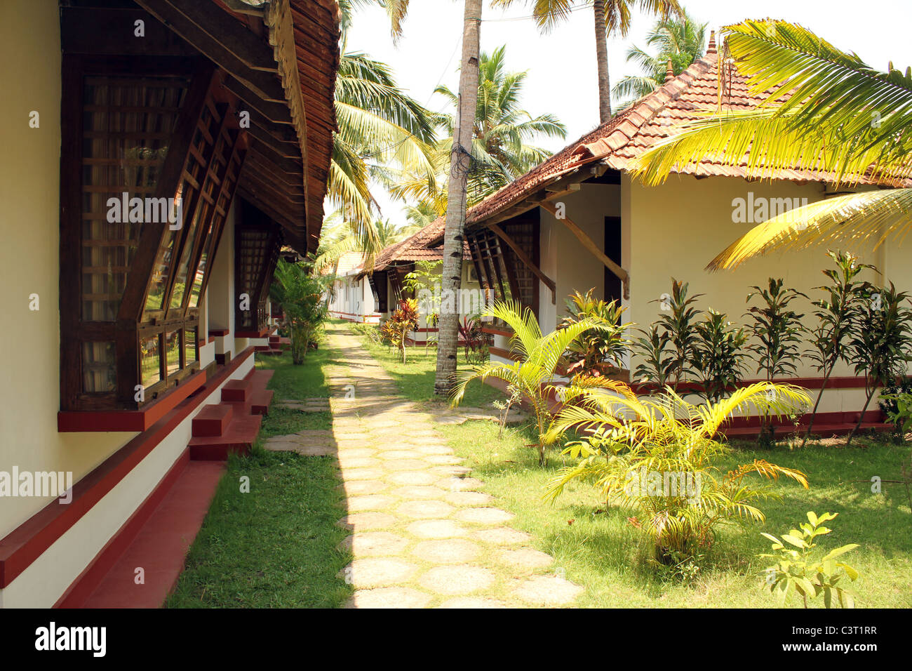 Cottages in cocco village resort, Kerala, India Foto Stock