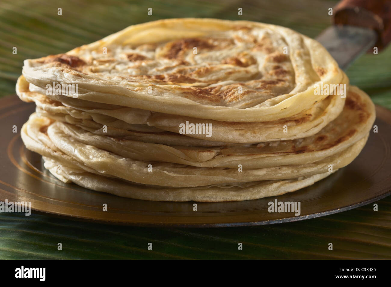 Parathas sul tawa indiano piatto pane Foto Stock