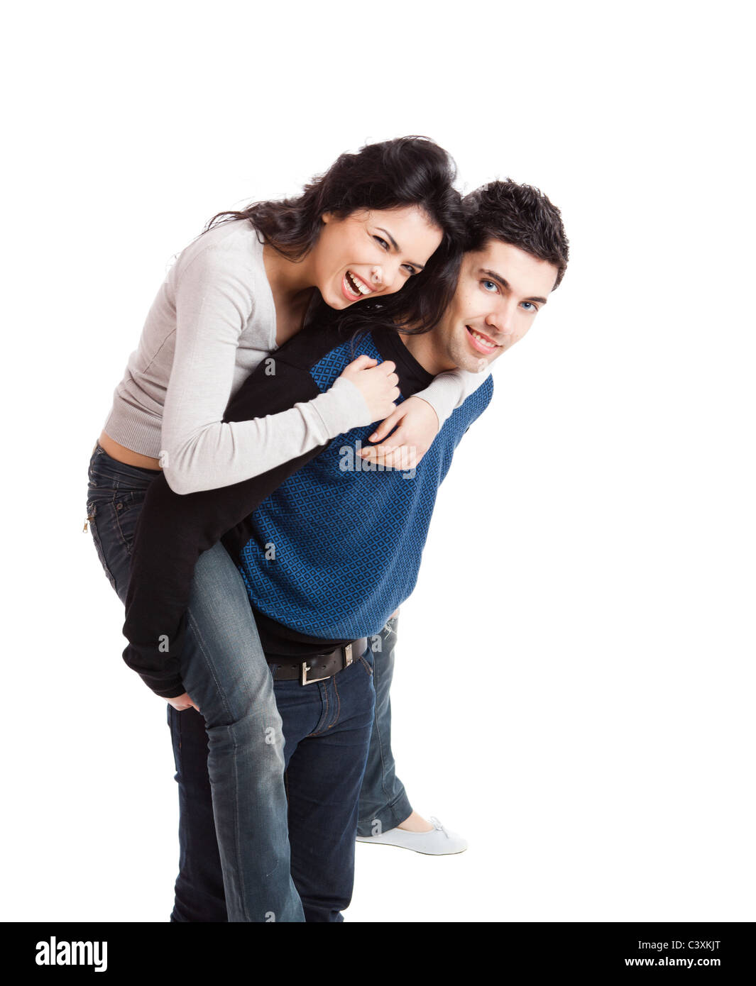 Attraente e felice coppia giovane isolate su uno sfondo bianco Foto Stock