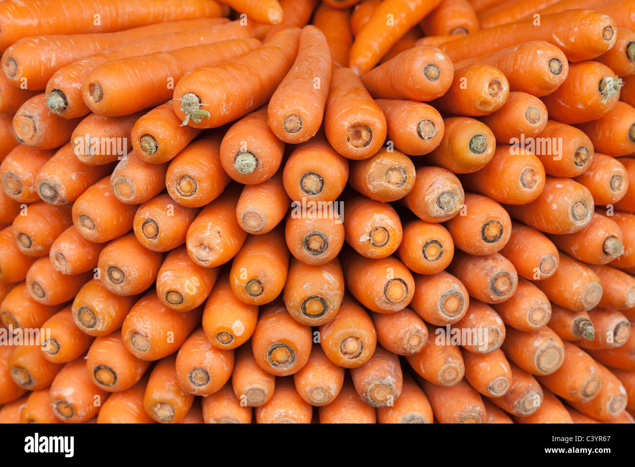 Le carote sul display nel mercato, Little India, Singapore Foto Stock