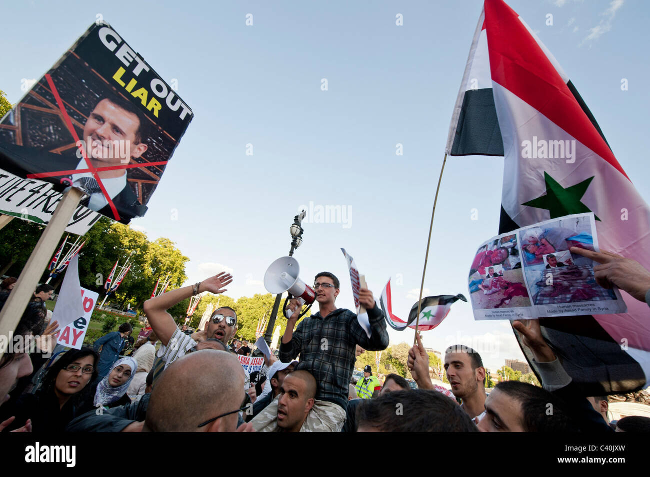 La visita di Stato del Presidente degli Stati Uniti Barack Obama per il Regno Unito è soddisfatta dalla libera proteste siria affrontare i sostenitori del Presidente Assad Foto Stock