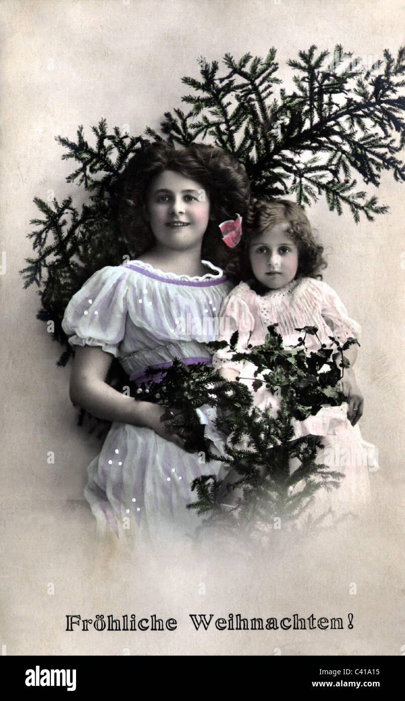Natale, due ragazze sotto un twig dell'abete, cartolina, inizio del 20 ° secolo, 'Natale felice!', diritti-aggiuntivi-clearences-non disponibile Foto Stock
