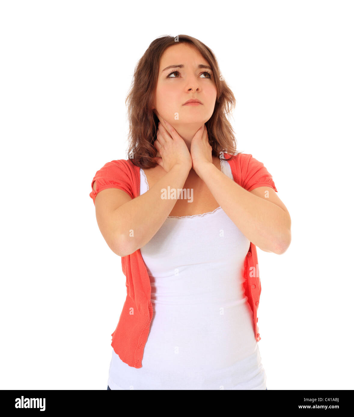 Attraente giovane donna ha mal di gola. Tutto su sfondo bianco. Foto Stock