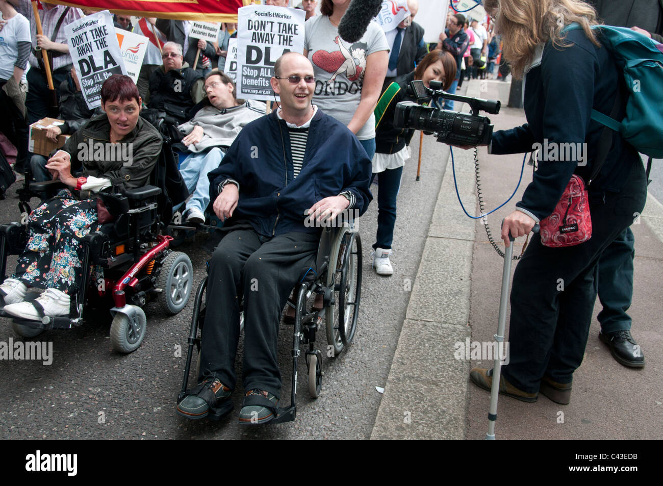 Hit dimostrazione contro il governo taglia i servizi per le persone con disabilità. Maggio11, Foto Stock
