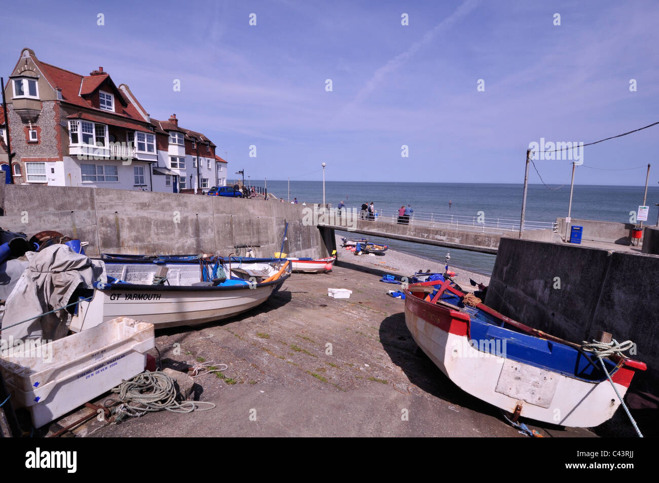 Barche di granchio tirato fino a Sheringham sulla Costa North Norfolk. Foto Stock