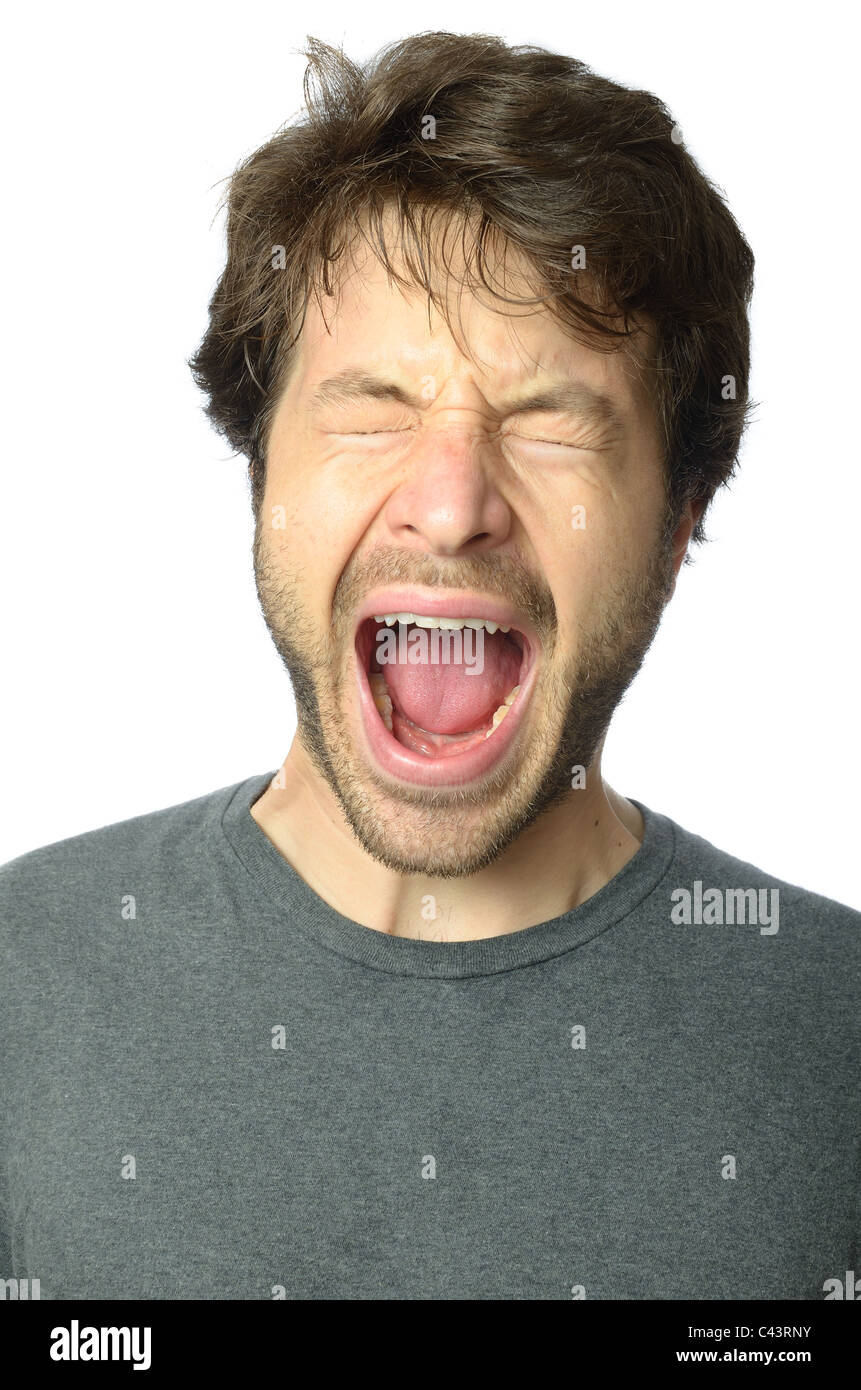 L'uomo urlando con la bocca aperta. Foto Stock