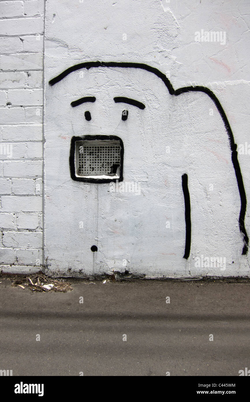 Disegno di un cane verniciato a spruzzo su una parete Foto Stock