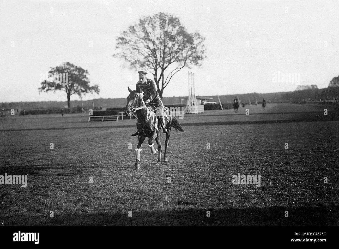 Jockey durante una corsa di cavalli, 1910 Foto Stock