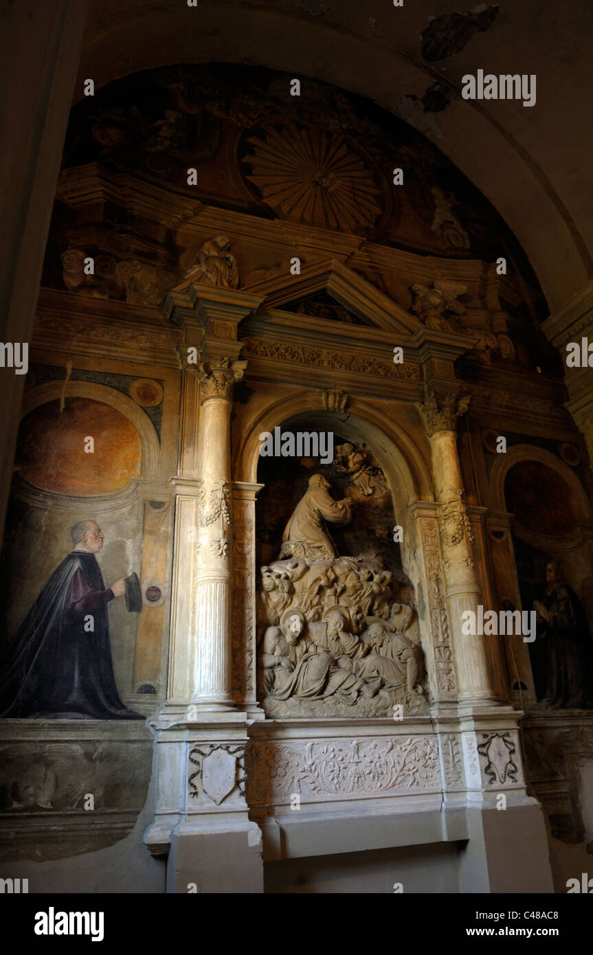 Gesù che prega nel giardino di Gesthemane 1521 altare scolpito in pietra tufacea e nella Chiesa di San Francesco a Ferrara Foto Stock